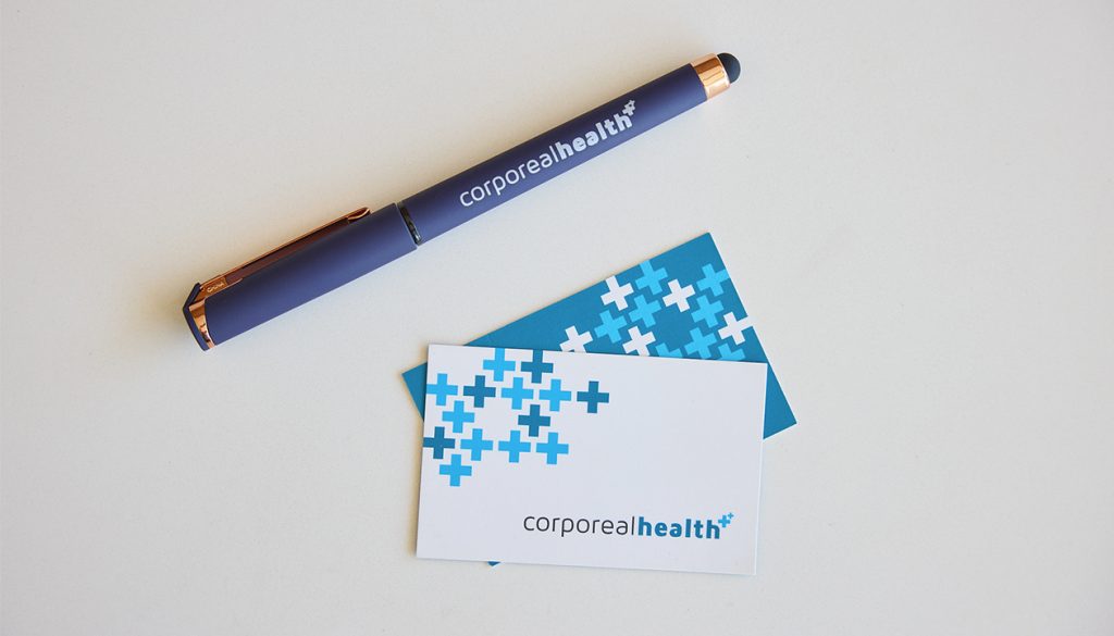 Corporeal Health business card and pen