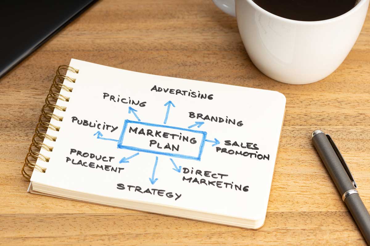 Marketing plan diagram on notebook